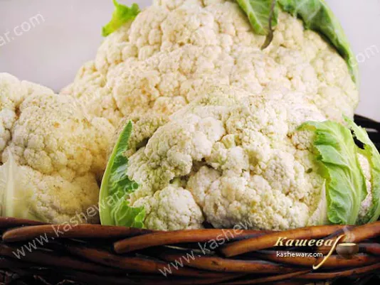 Fresh cauliflower on the kitchen table