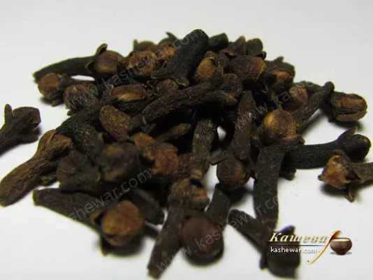 Dried clove spice buds on a kitchen table