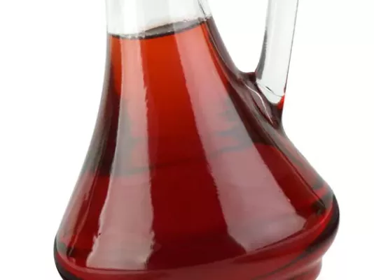 Red wine vinegar in a glass bottle