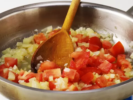 Adding the tomatoes
