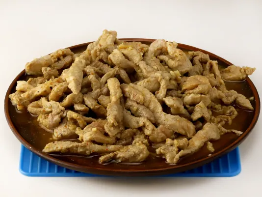 Frying the Meat with Garlic
