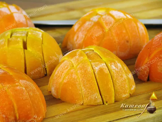 Slicing frozen oranges