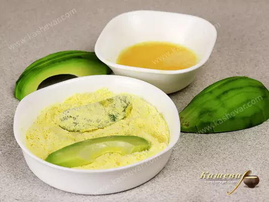Sliced avocado in egg