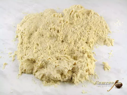Stretching the dough on the table