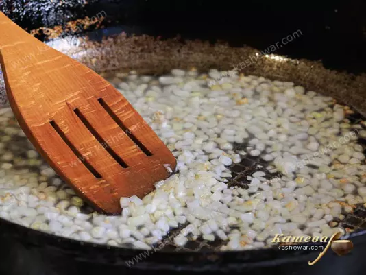 Finely chopped onion in a pan