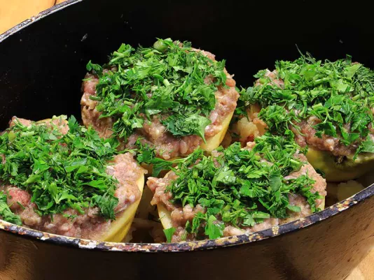 Chopped greens over stuffed quince