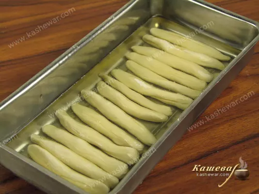 Dough strips in oil