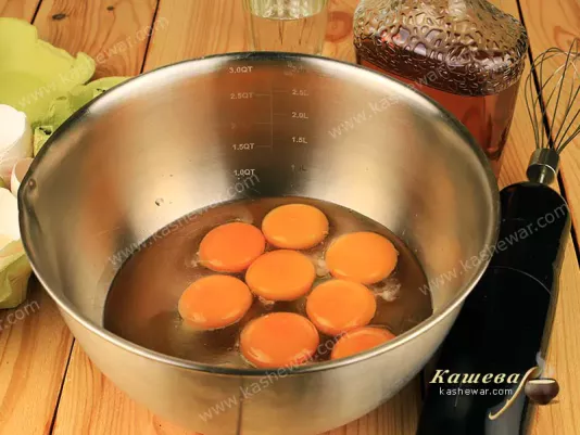 Yolks whipped into sugar syrup
