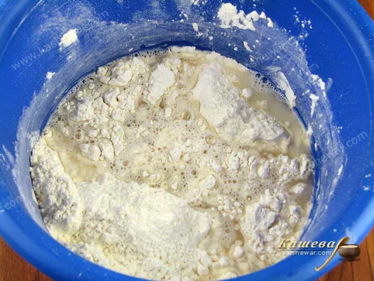 Mix yeast with flour and add water