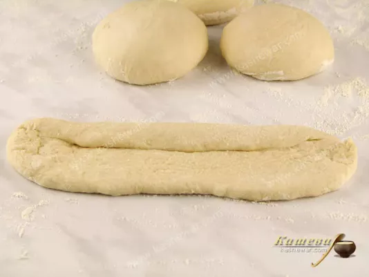 From the dough start to form a baguette