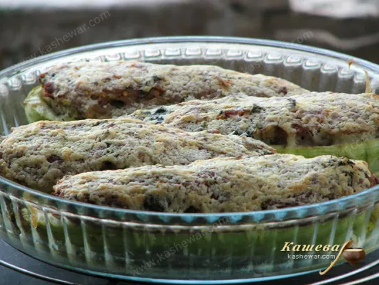 Baked stuffed zucchini with sauce