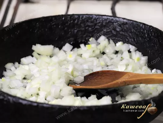 Finely chopped onion in a skillet