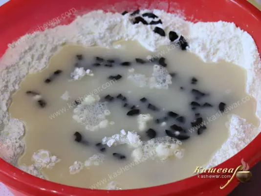 Black olives in dough