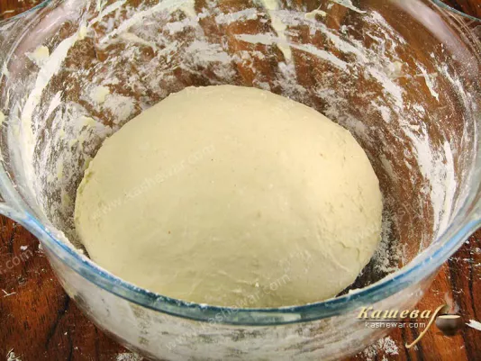 Put the dough in a warm place so that it rises