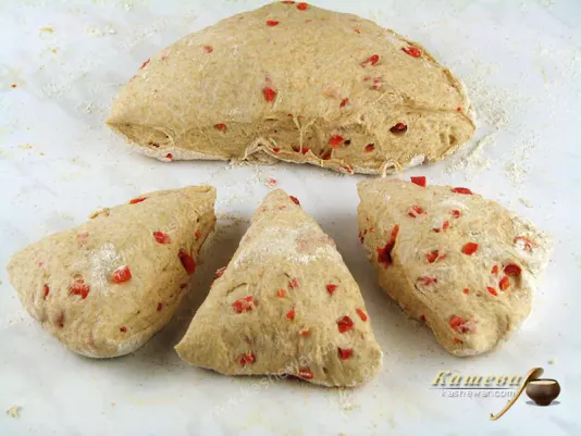 Dividing the dough for fougasses into triangles