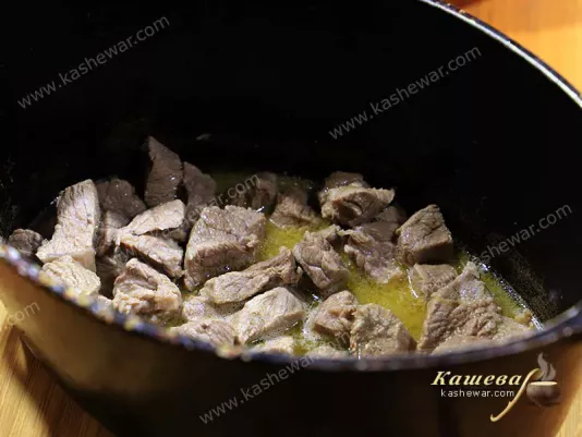 Beef fried in a roasting pan