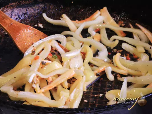 Sweet pepper strips in a frying pan