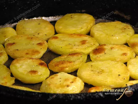 Roasting potatoes in a pan