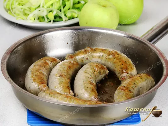 Sausages in a frying pan