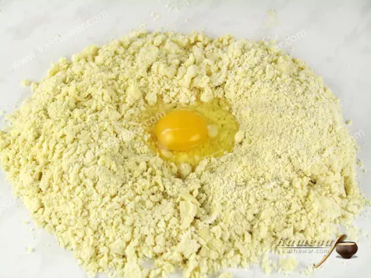 Add an egg to the dough