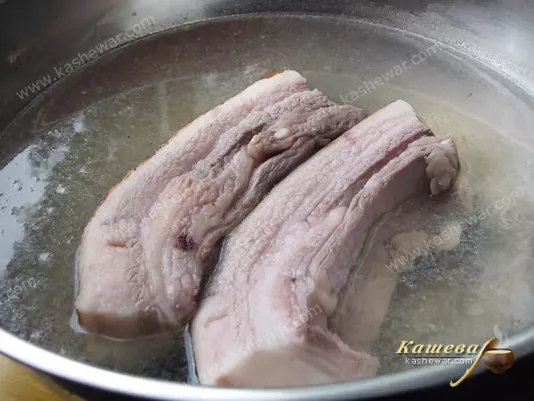 Boiling pork belly before salting