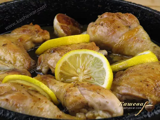 Adding honey, soy sauce and lemons to the chicken