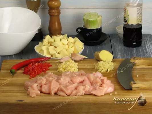 Sliced chicken, chili, garlic and ginger