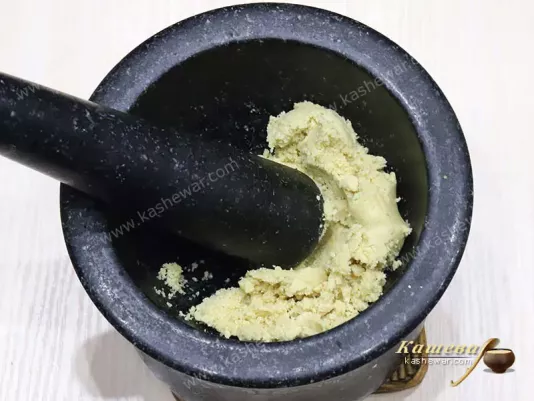 Nuts grated in a mortar