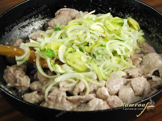 Vegetables added to fried pork