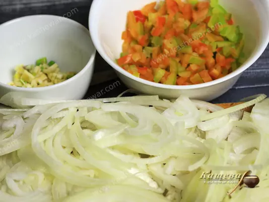 Chopped onion in half rings and finely chopped pepper