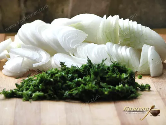 Chopping onions and dill for Nezhinsky salad