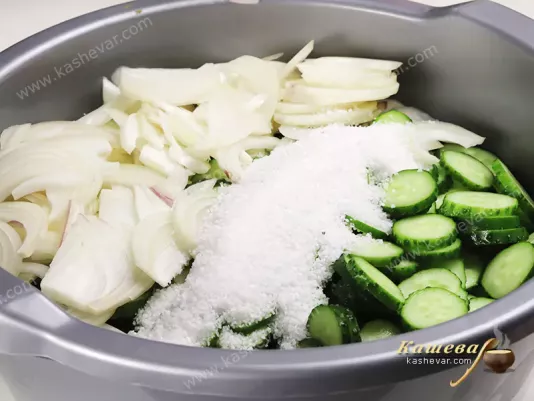 Onions and cucumbers with salt