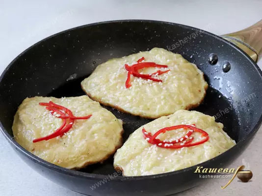 Zucchini fritters with hot pepper