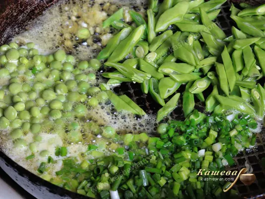 Green vegetables in a frying pan