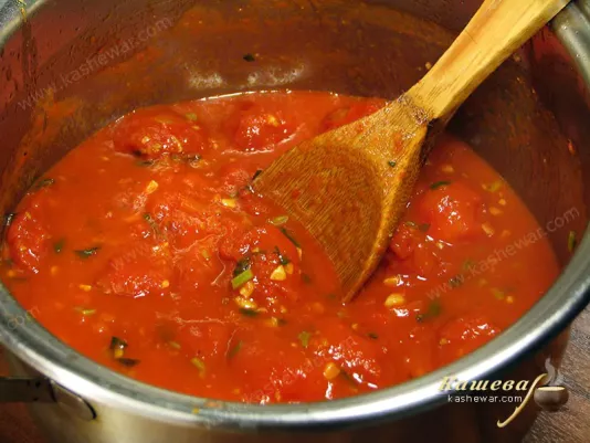 Simmering tomato soup ingredients