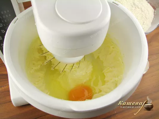 Add egg to butter and sugar