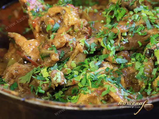 Rooster with vegetables and spices
