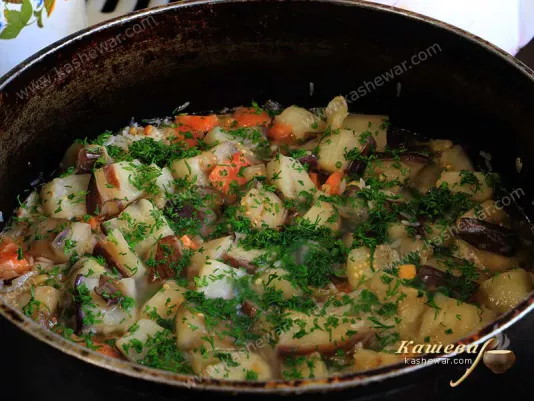 Pilaf with tomatoes and eggplant