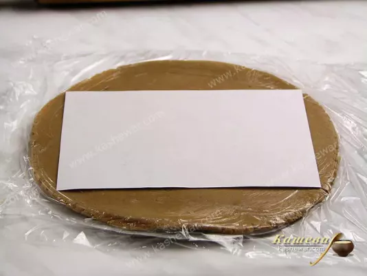 Cutting house of gingerbread