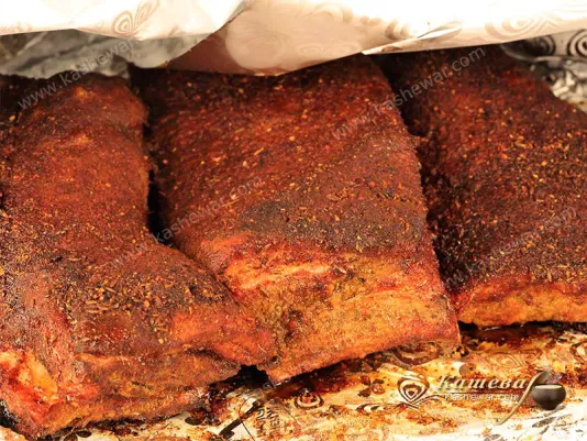 Foil-covered pork ribs