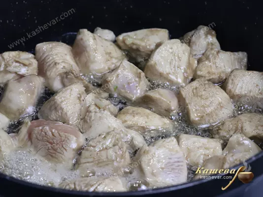 Chicken fillet in a frying pan