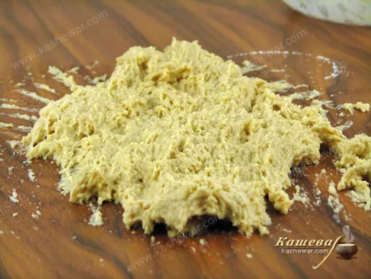 Put the dough on the table and stretch knead