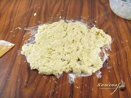 Rub the dough with butter over the surface
