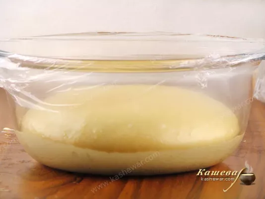 Place the dough in a bowl, cover with cling film and keep warm
