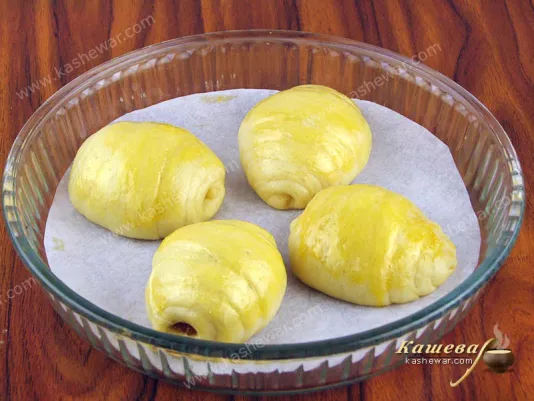 Place rolls on a baking sheet and let rise