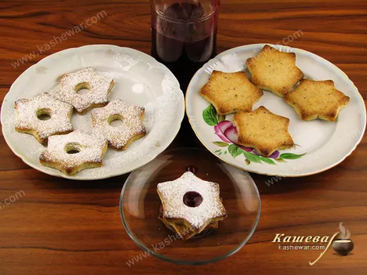 Connect cookies with raspberry jam