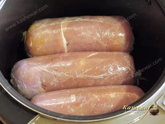Turkey fillet rolls laid in a slow cooker