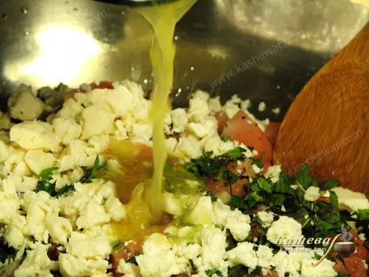 Adding lemon juice and zest to watermelon salad