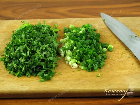 Wash and chop green onions and herbs