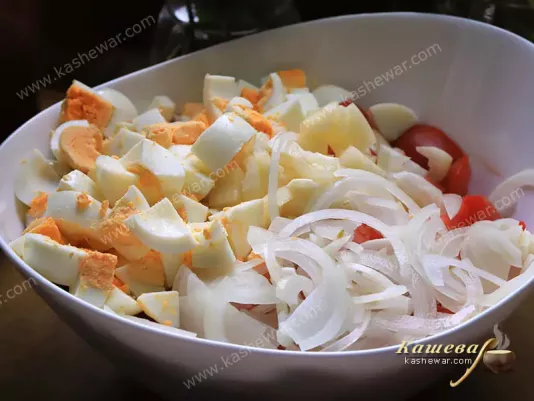 Thinly chopped onion with chopped egg